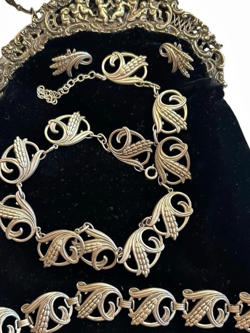 Vintage Danecraft Sterling Silver Necklace, earrings, and
Bracelet set.